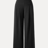 Pantaloni largi cu talie medie, din material Ponte de bambus fluid, cu buzunare.