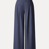 Pantaloni largi cu talie medie, din material Ponte de bambus fluid, cu buzunare.