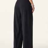 Pantaloni largi cu talie medie, din material Ponte de bambus fluid, cu buzunare.