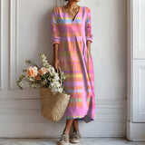 Sorina – Rochie Artistică cu Fundal Bogat și Siluetă Fluidă